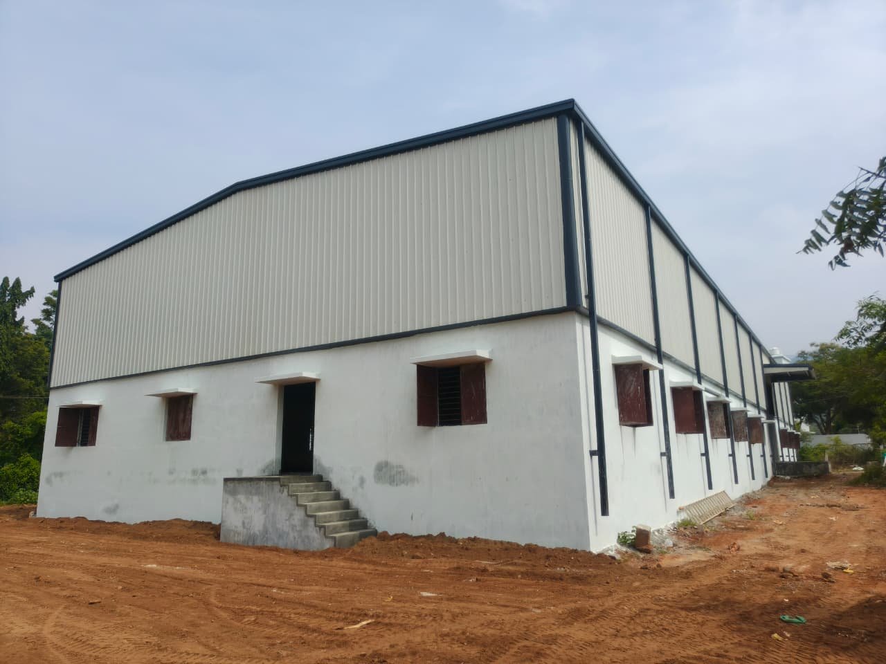 Industrial Warehouse & Production Facility – PEB Structure