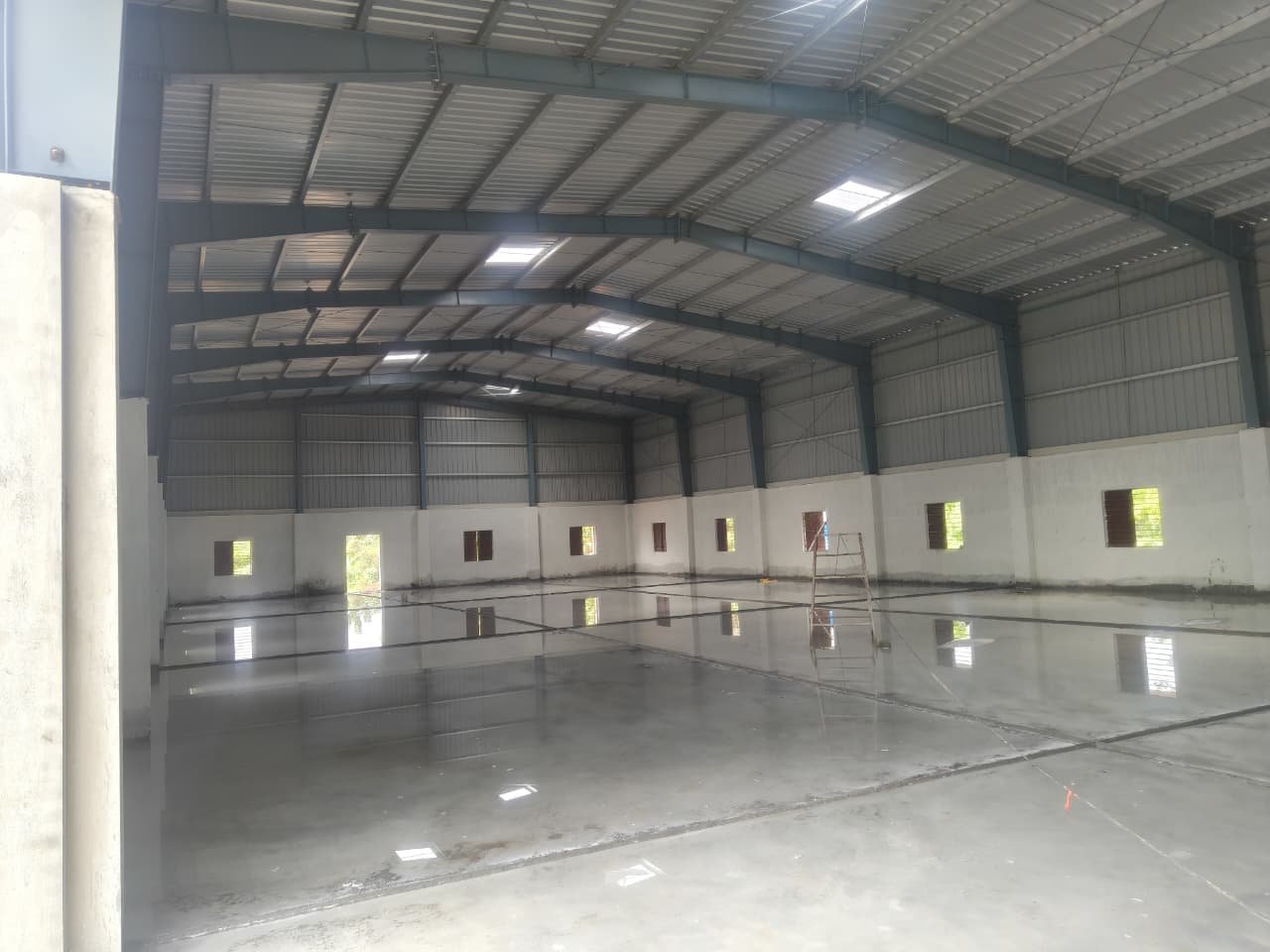 Commercial steel warehouse construction - Vedha Structures